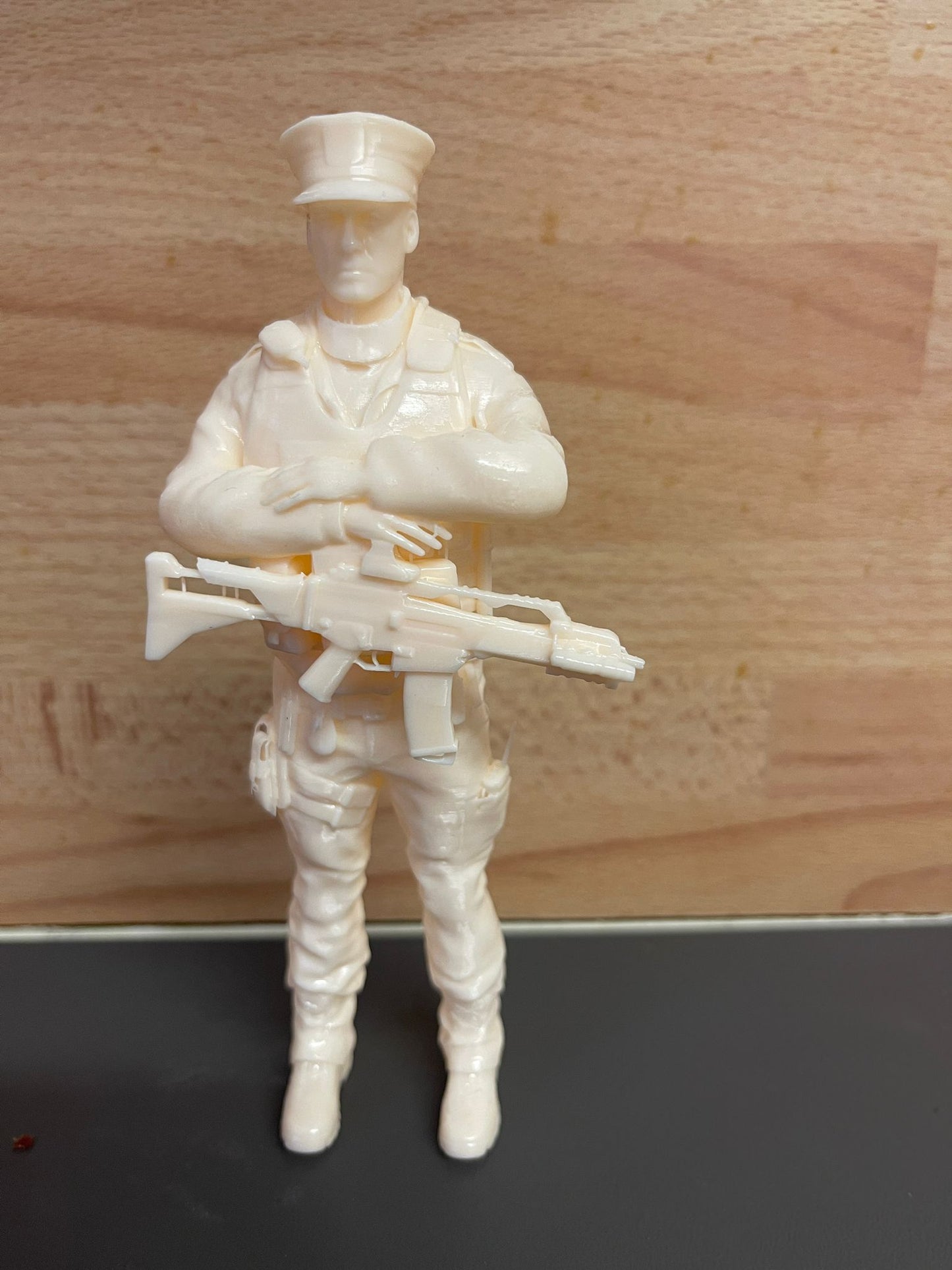 EMS 14 – Armed Police Officer Model Figure (Arms Folded, Vest On) For Tactical, Law Enforcement, and Urban Security Dioramas