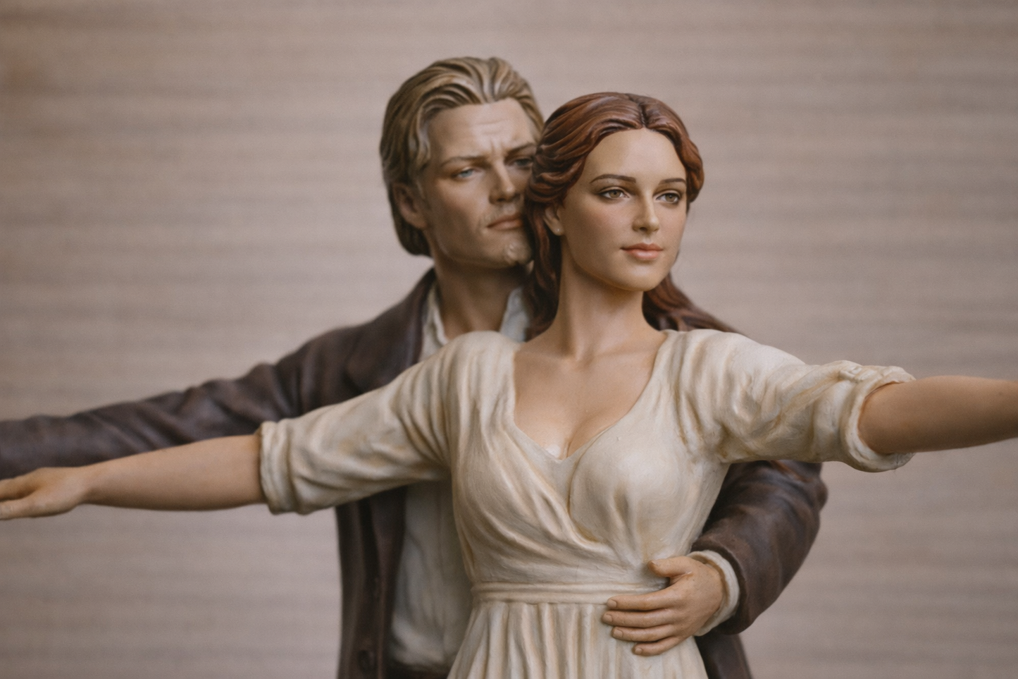 W69 Young Couple with Arms Outstretched – “Bow of the Ship” Pose – UNPAINTED