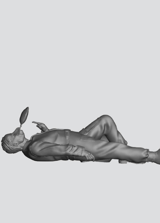 EMS28C – Scale Model Figure: Injured Motorcyclist Casualty Lying Down with Helmet and Resuscitation Bag