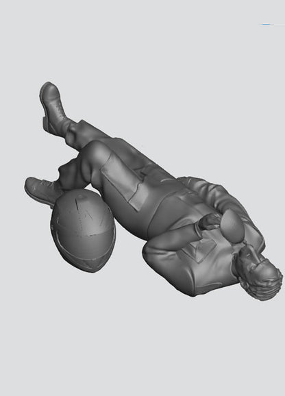 EMS28C – Scale Model Figure: Injured Motorcyclist Casualty Lying Down with Helmet and Resuscitation Bag