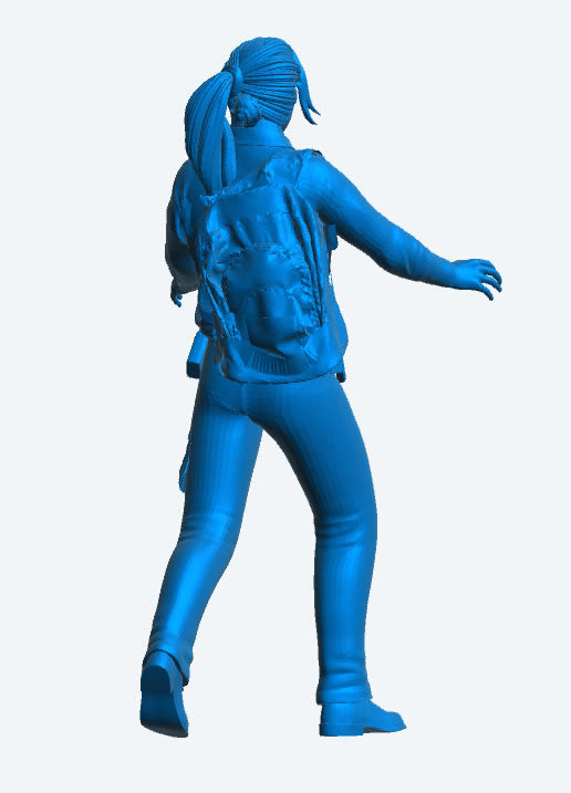 EMS33 – Scale Model Figure: Female Paramedic with Backpack Pushing Stretcher