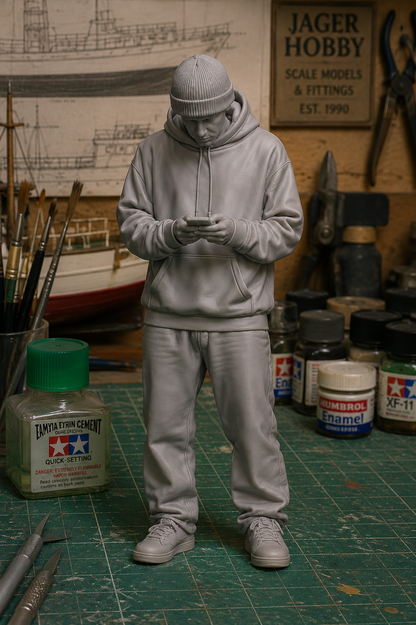 M118 – Unpainted Scale Model Figure – Working Male Looking at Phone